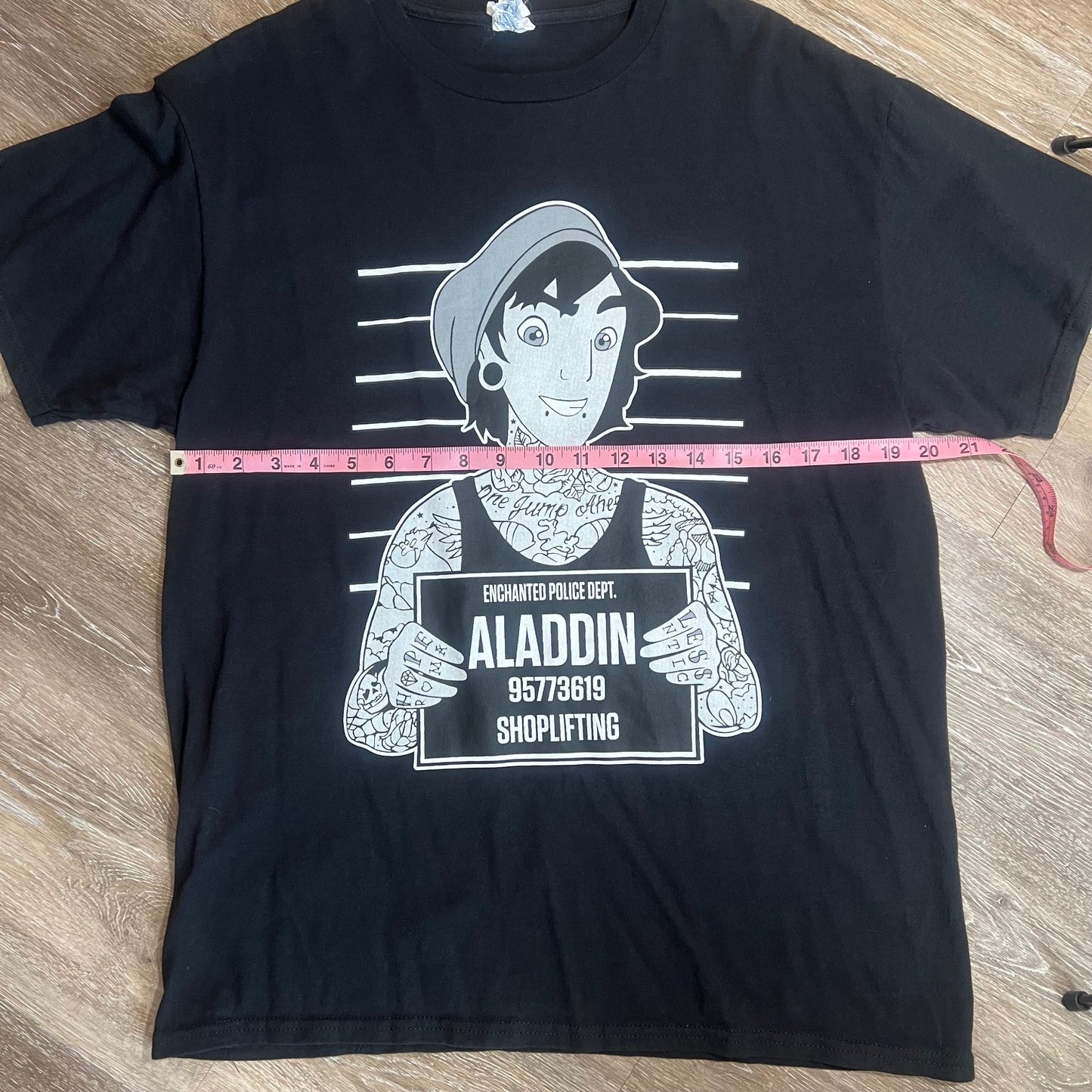 Aladdin's Last Wish: Mugshot Mischief Tee